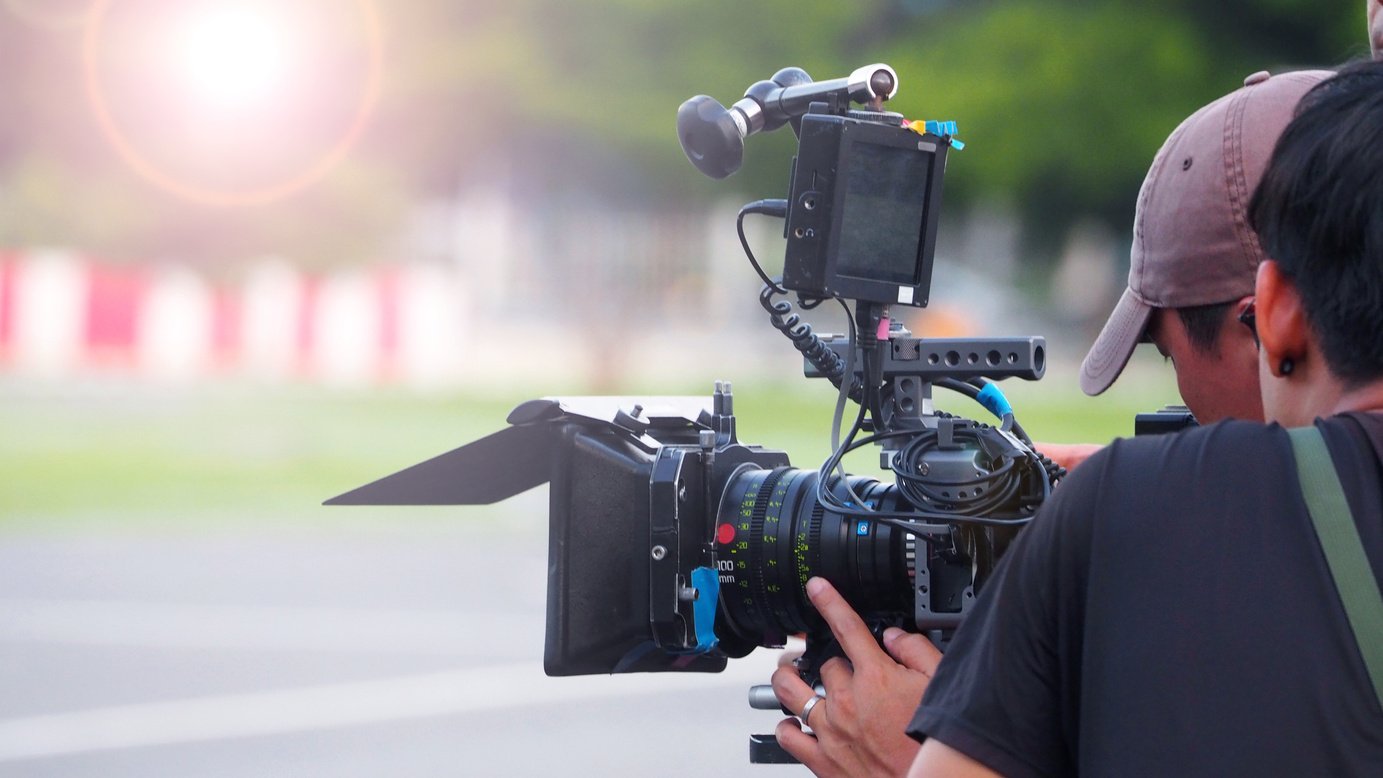 Production Crews on Movie Shooting with Light Flare